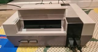 Nintendo NES con caja y Mario Bros