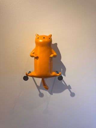 Figura gato naranja decorativa
