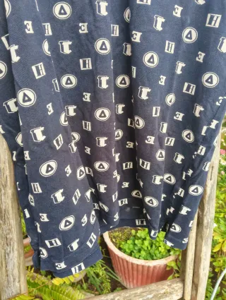 Polo H&M Blu con stampe geometriche