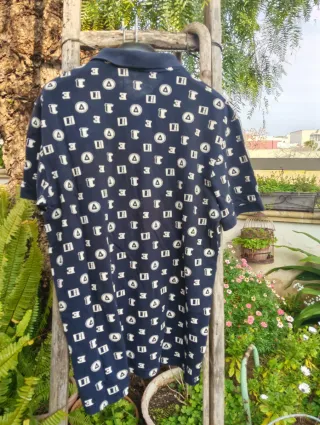 Polo H&M Blu con stampe geometriche