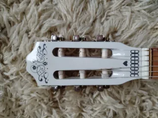 Guitarra Coco Blanca versions limitada