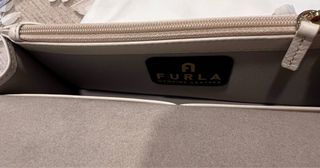 Borsetta Furla bianca con logo in Swarovski