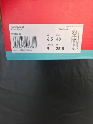 Zapatillas Puma altas negras y blancas