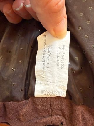 Cama para perro beige y marrón