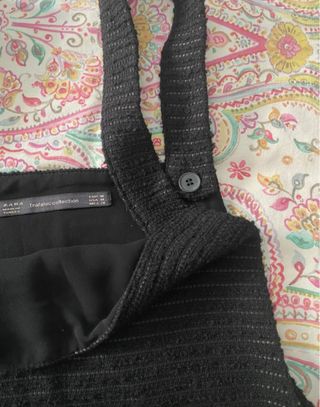 Peto negro con bolsillos