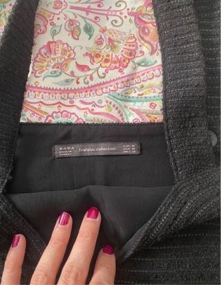 Peto negro con bolsillos