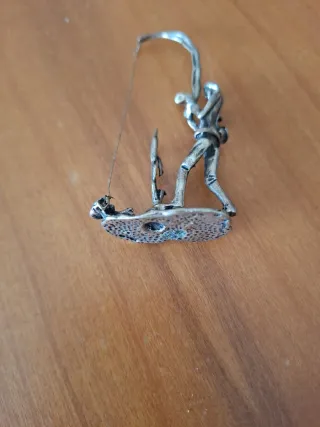 Figura pescador metal