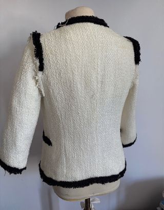 Chaqueta tweed bolsillos