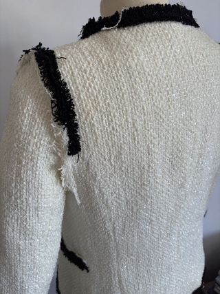 Chaqueta tweed bolsillos