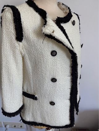 Chaqueta tweed bolsillos