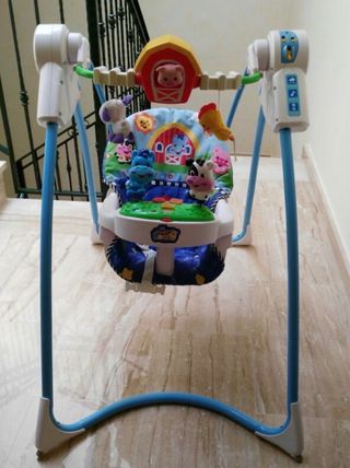 Columpio para bebé con juguetes