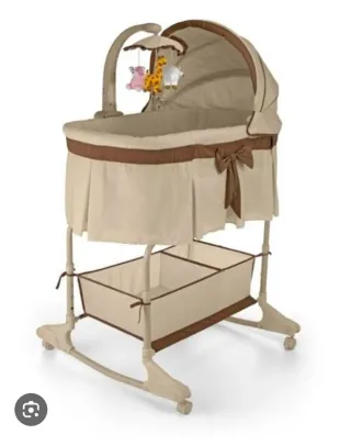 Minicuna balancín/ruedas con carrusel