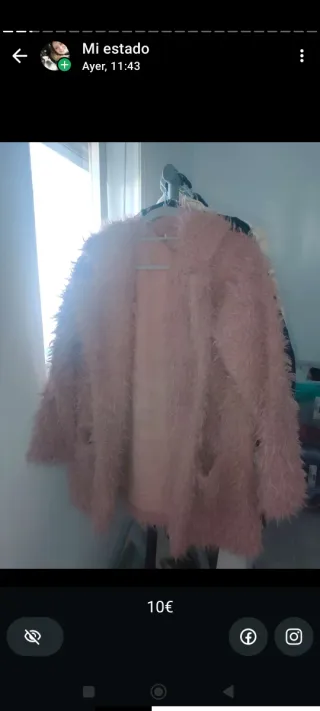 Abrigo pelo rosa usado una vez