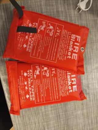 2 Mantas Protección Ignífugas 1.5x1.5m para hogar.