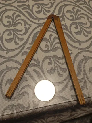 Metro plegable de madera y metal