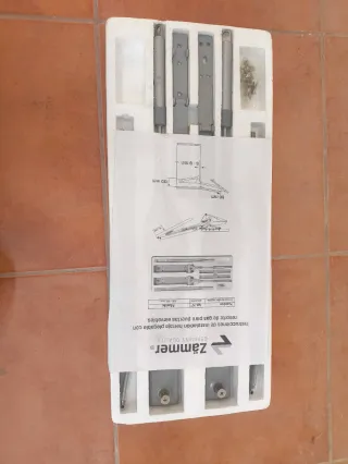 Herrajes elevador puerta doble Zämmer