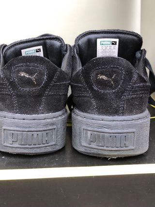Sneakers Puma nere con punta oro