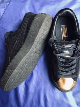 Sneakers Puma nere con punta oro