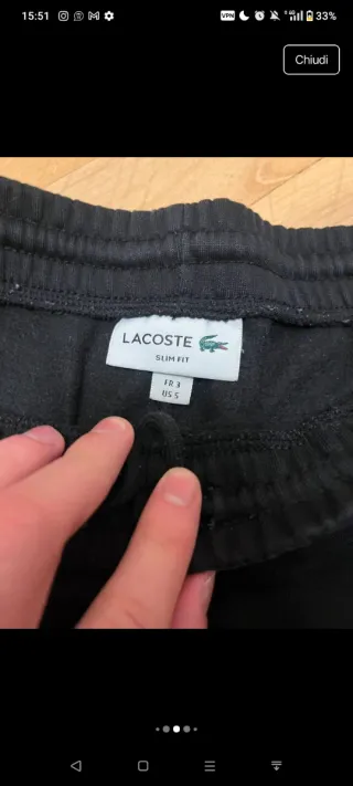 Tuta Lacoste nera