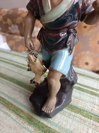 Figura porcelana pescador chino