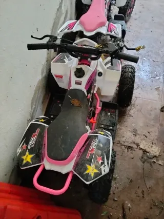 Quad infantil rosa y blanco