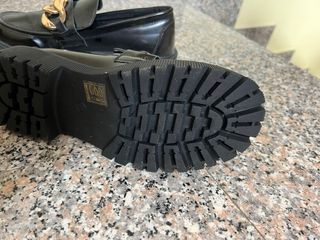 Mocassini neri donna con fibbia oro