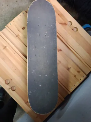 Monopatín Oxelo con diseño de oso