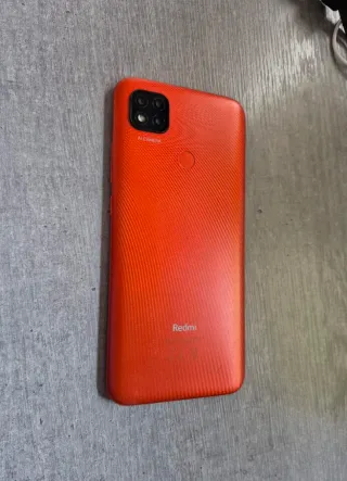Móvil Xiaomi Redmi 9C naranja-rojo con Cámara IA