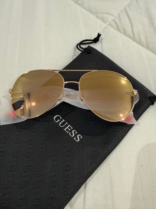 Occhiali da sole Guess dorati da donna