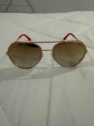 Occhiali da sole Guess dorati da donna