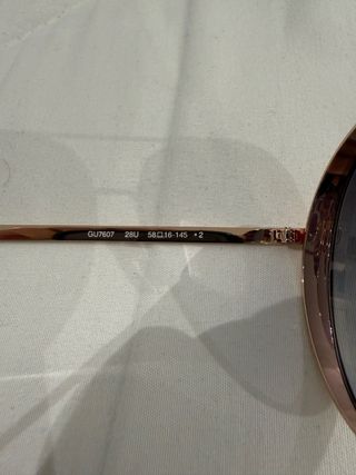 Occhiali da sole Guess dorati da donna