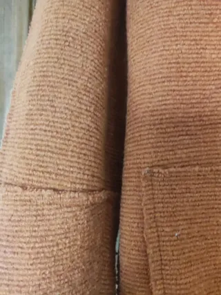 Americana marrón/naranja. De punto