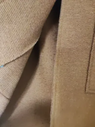 Americana marrón/naranja. De punto