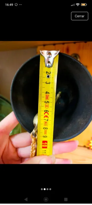 Campana de bronce náutica con ancla