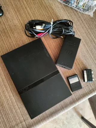 Kit completo Play statiom 2. PS2 Slim+10 Juegos