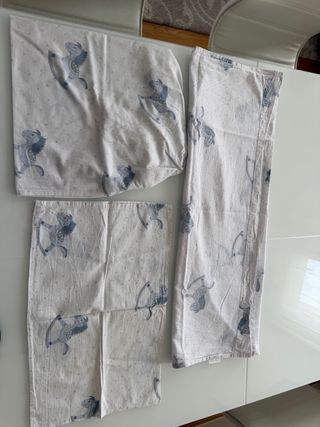 Juego sábanas minicuna caballitos