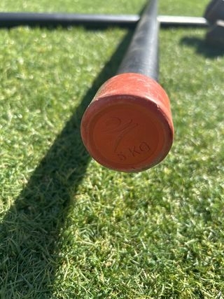 Barras y pesas para entrenamiento