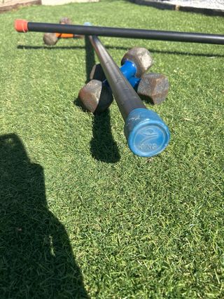 Barras y pesas para entrenamiento