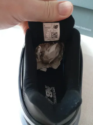 Zapatillas New Balance Negras y Plateadas