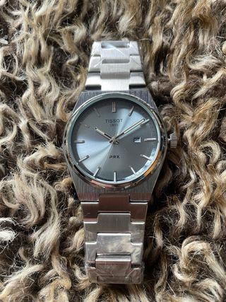 Reloj Poedagar Azul y Plateado