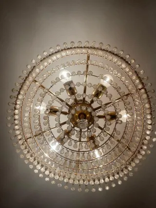 Lámpara de araña de cristal y metal