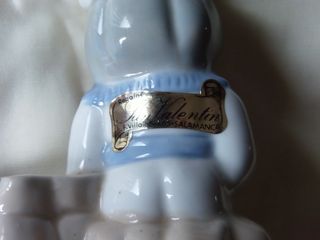 Juego 3 figuras cerámica: niño, niña, anciano.