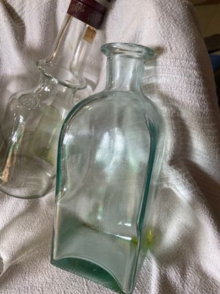 Bottiglie di vetro antiche decorative