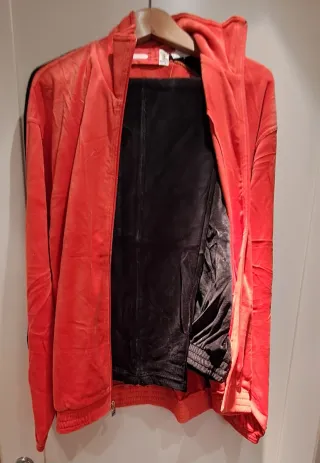 Tuta Ferrari ciniglia rossa e nera