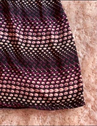 Top largo morado con estampado