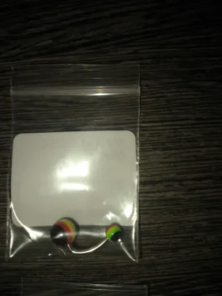 Piercing ombligo plateado rasta