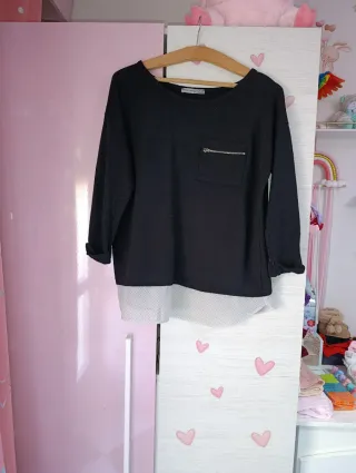 Jersey negro con bolsillo cremallera