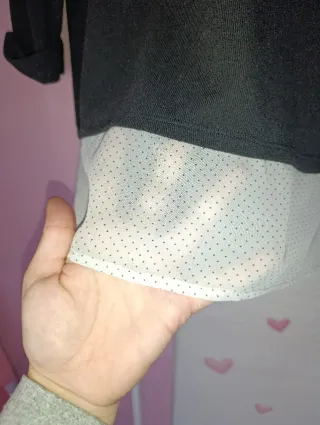 Jersey negro con bolsillo cremallera