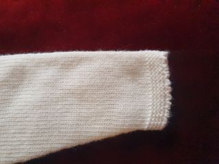 Vestido de bebé blanco con lazo amarillo