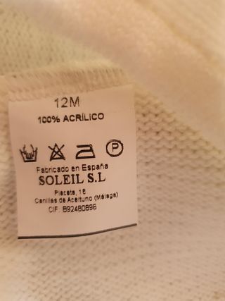 Vestido de bebé blanco con lazo amarillo